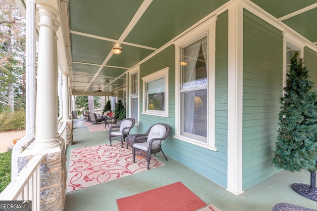 view of patio featuring a porch