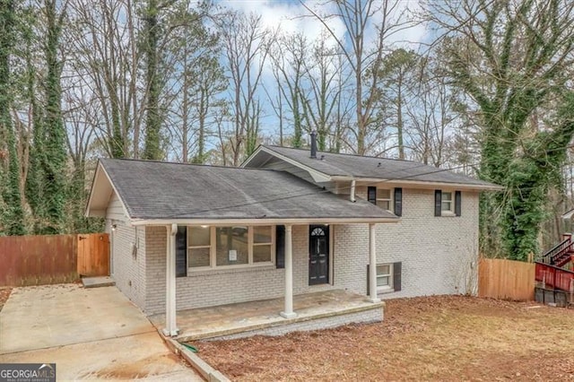 split level home with a porch