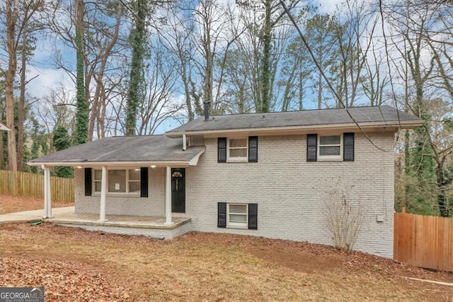 split level home featuring a patio area