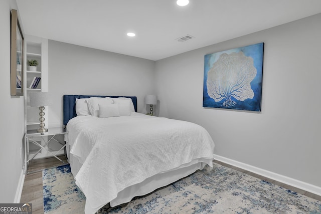 bedroom featuring hardwood / wood-style flooring