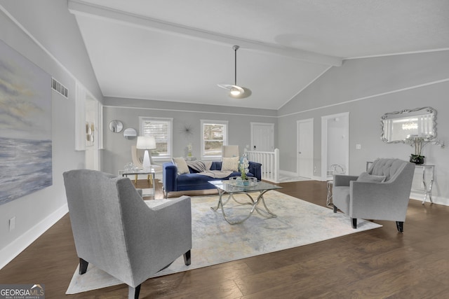 living room featuring dark hardwood / wood-style floors and lofted ceiling with beams