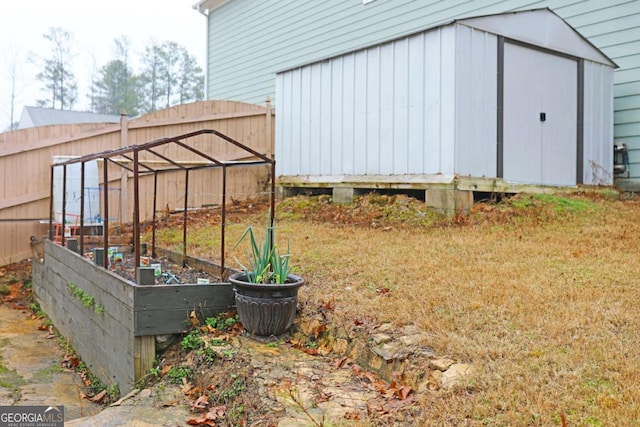 view of outbuilding with a yard