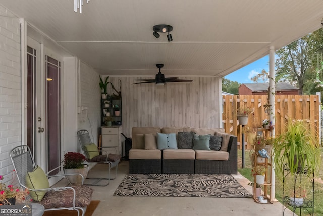 view of patio with ceiling fan and an outdoor hangout area