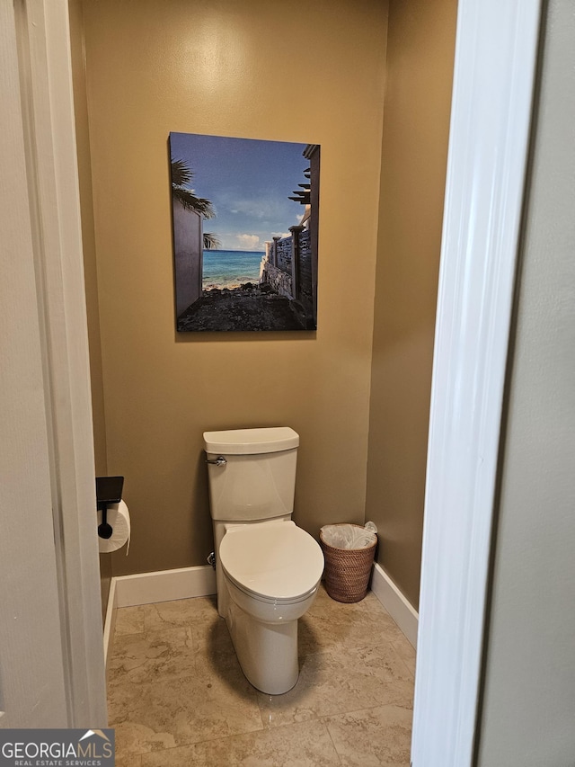 bathroom featuring toilet