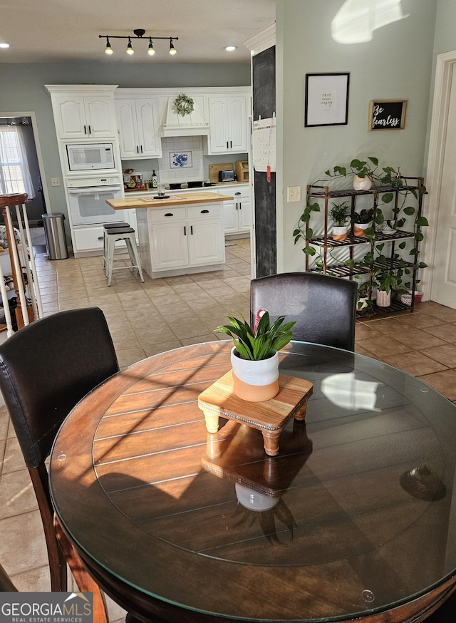 view of tiled dining space