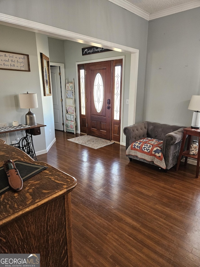 foyer with crown molding and dark wood-type flooring