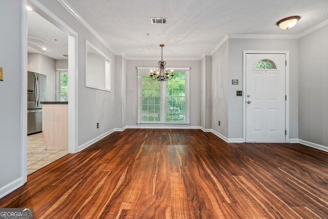 kitchen featuring a ceiling fan, light tile patterned flooring, a sink, dark countertops, and stainless steel appliances