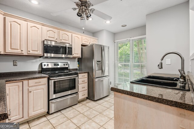 bonus room with a textured ceiling, visible vents, carpet flooring, lofted ceiling with skylight, and baseboards