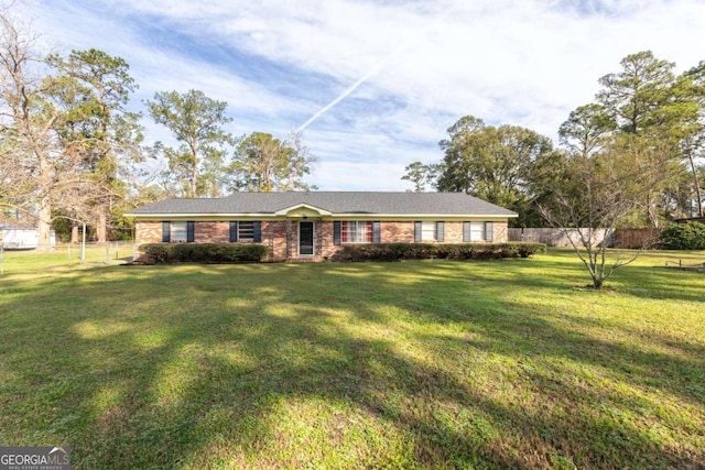 single story home featuring a front yard