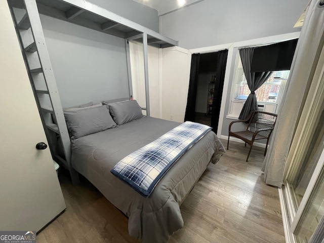 bedroom featuring light wood-type flooring