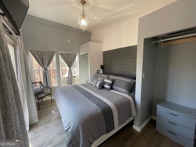 bedroom featuring hardwood / wood-style floors