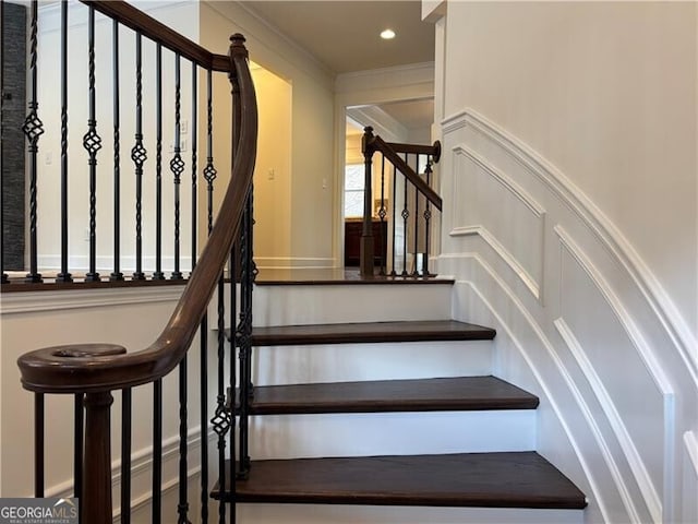 stairs featuring ornamental molding