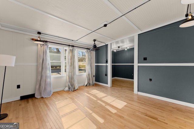 unfurnished room featuring hardwood / wood-style flooring