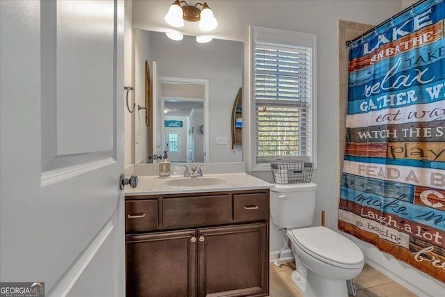 3890 Pleasant Woods Dr, Cumming, GA 30028 - bathroom with toilet, tile patterned flooring, and vanity
