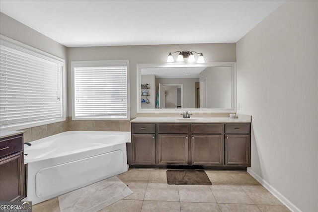 3890 Pleasant Woods Dr, Cumming, GA 30028 - full bath with a garden tub, tile patterned flooring, vanity, baseboards, and a shower