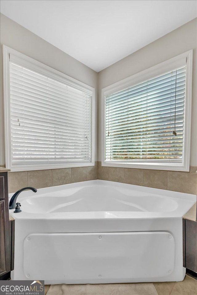 3890 Pleasant Woods Dr, Cumming, GA 30028 - bathroom with a garden tub