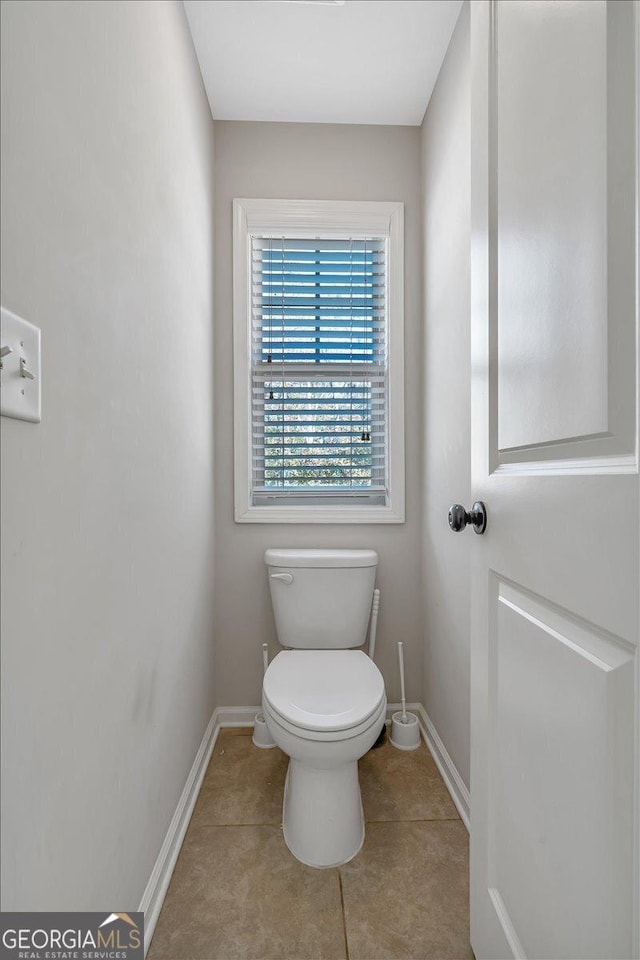 3890 Pleasant Woods Dr, Cumming, GA 30028 - bathroom with toilet, baseboards, and tile patterned floors