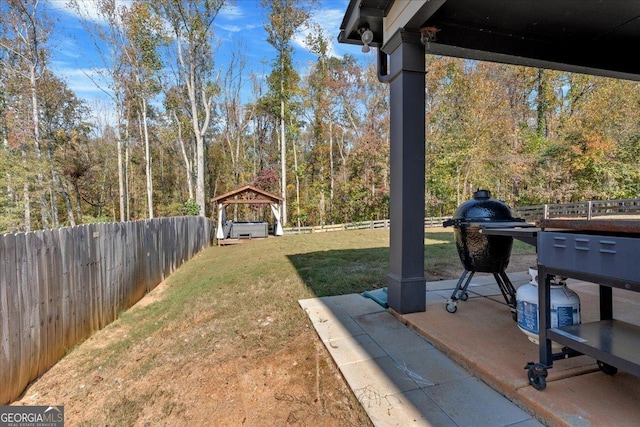 3890 Pleasant Woods Dr, Cumming, GA 30028 - view of yard with a gazebo, a patio, and a fenced backyard