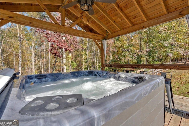 3890 Pleasant Woods Dr, Cumming, GA 30028 - wooden deck with a hot tub and a view of trees