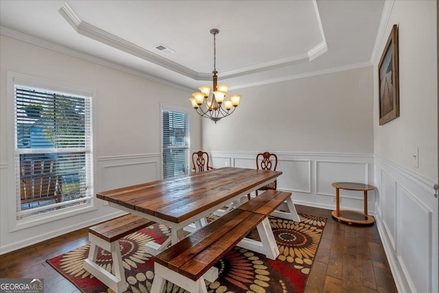 3890 Pleasant Woods Dr, Cumming, GA 30028 - dining area featuring dark wood finished floors, a raised ceiling, visible vents, and a notable chandelier