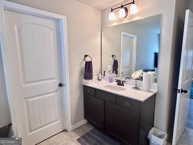 bathroom featuring vanity and tile patterned flooring