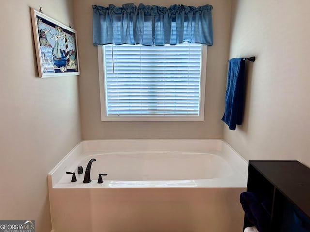 full bath featuring a bath