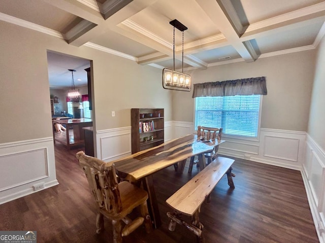 dining area featuring beamed ceiling, wood finished floors, and a chandelier