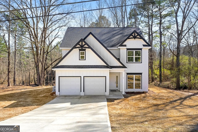 modern inspired farmhouse featuring a garage, roof with shingles, and driveway