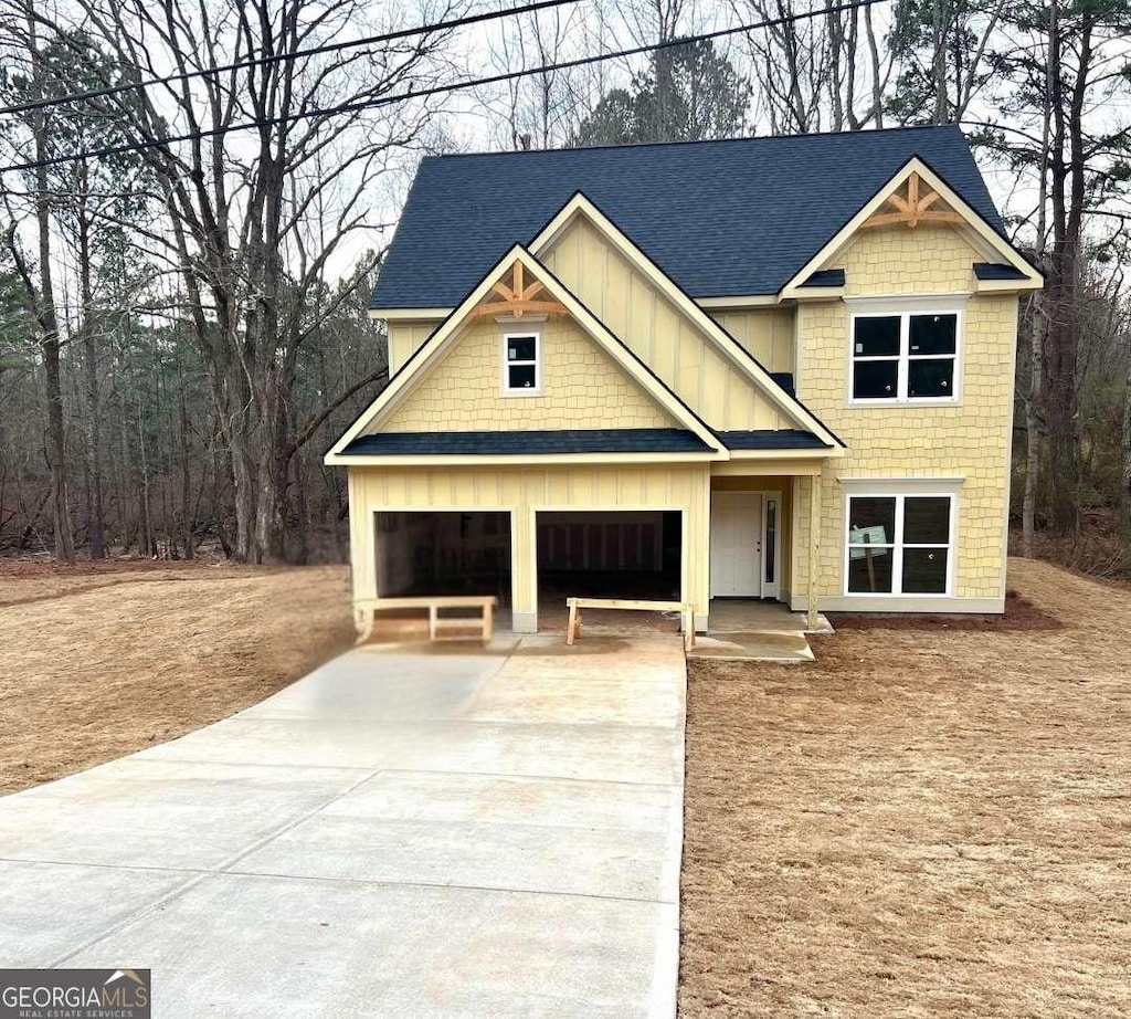 craftsman inspired home featuring a garage