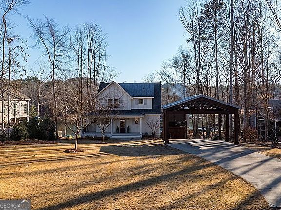 view of front of property with a gazebo and a front lawn