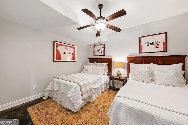 bedroom featuring hardwood / wood-style floors and ceiling fan