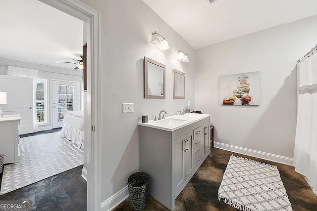 bathroom featuring vanity and ceiling fan