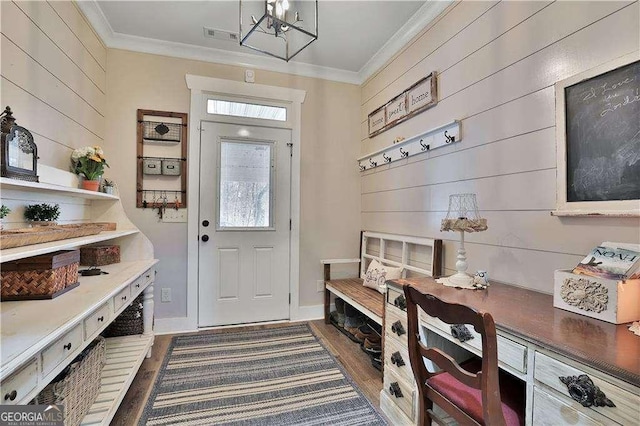 mudroom featuring ornamental molding, dark hardwood / wood-style flooring, and wood walls