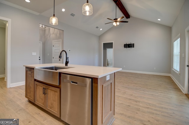kitchen featuring decorative light fixtures, an island with sink, sink, stainless steel dishwasher, and light wood-type flooring
