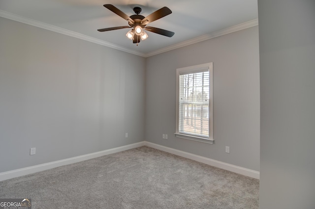 unfurnished room featuring ceiling fan, ornamental molding, and light carpet