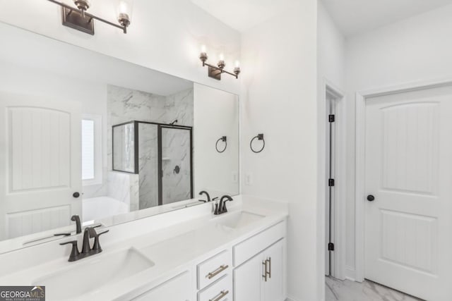 bathroom featuring vanity and separate shower and tub