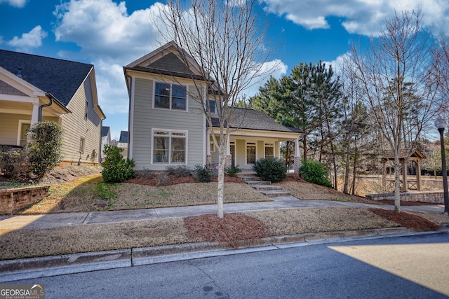 view of front property featuring a porch
