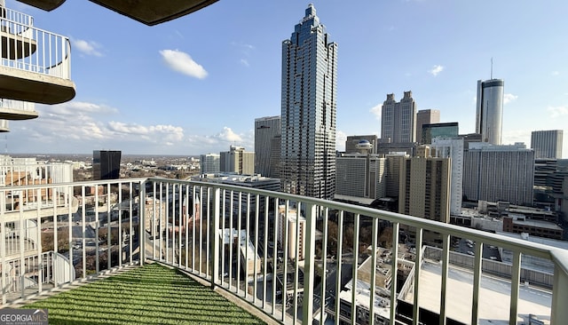 balcony featuring a city view