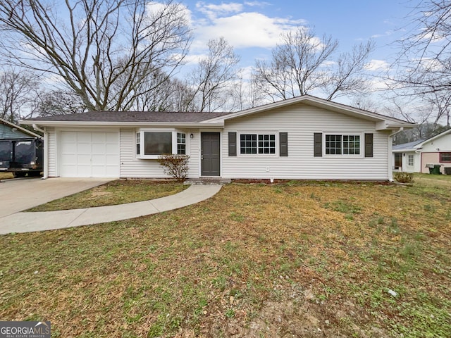 single story home featuring a garage and a front yard