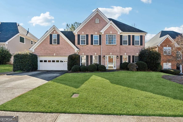 view of front facade featuring a garage and a front lawn