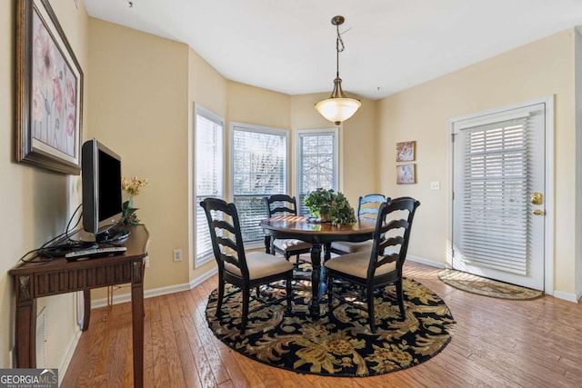 dining room with hardwood / wood-style floors