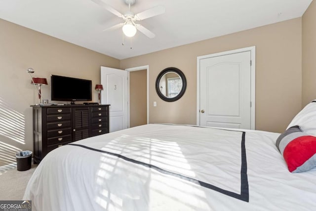 bedroom featuring ceiling fan and carpet flooring