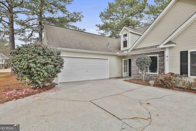 view of front of property with a garage