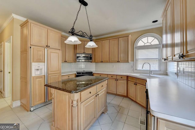 kitchen featuring sink, crown molding, a center island, hanging light fixtures, and paneled refrigerator