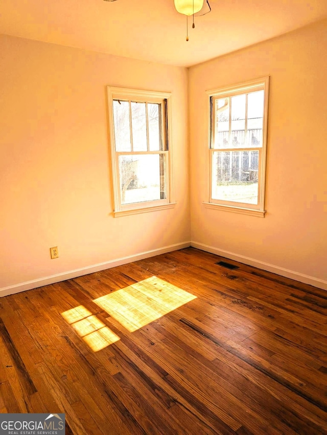617 W Currahee St, Toccoa, GA 30577 - unfurnished room featuring plenty of natural light and wood finished floors