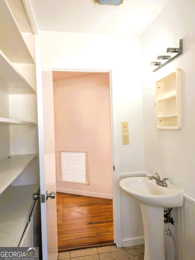 bathroom with sink and tile patterned floors