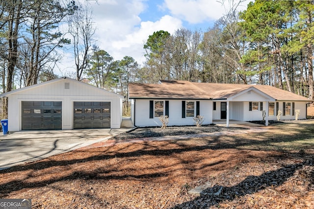 ranch-style home featuring a garage