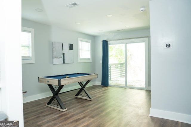 game room with pool table and dark hardwood / wood-style floors