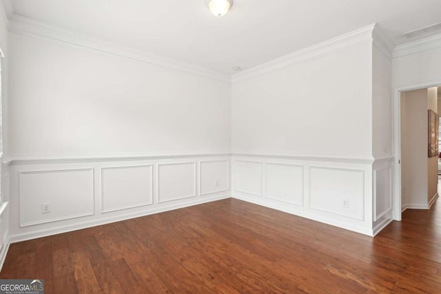 unfurnished room with dark hardwood / wood-style flooring and ornamental molding