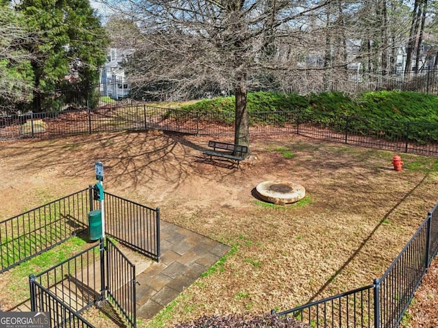 view of yard featuring a fire pit